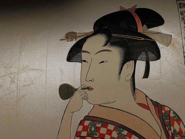 Young Woman Blowing a Popen (glass noisemaker) from the series Ten Classes of WomenÕs Physiognomy by Kitagawa Utamaro, (Large print size) / BJ327-145